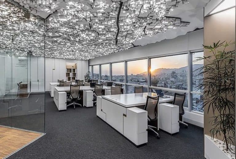 Pardisan modern office with professional travel team arranging Iran tours and tailored travel packages