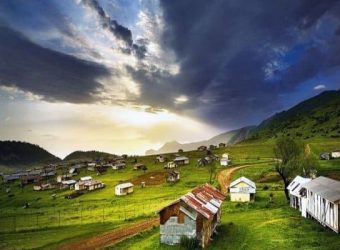 Scenic landscape of Ziarat village with houses and mountains taken at one of Iran tours